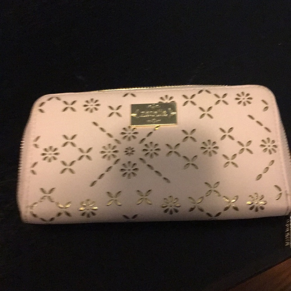 Pink and gold Nanette Lepore wallet.